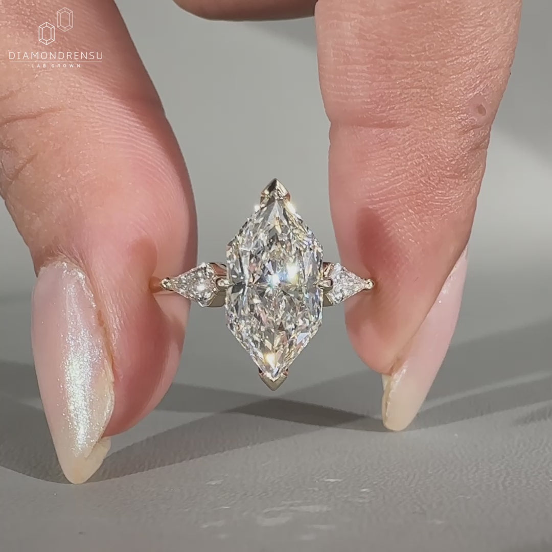 Dutch Marquise Engagement Ring in yellow gold tapered shank band.
