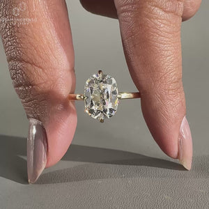 Old mine cushion cut diamond ring in rose gold ring.

