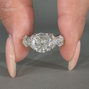 Portuguese ring marquise side stones twisted pave set.