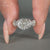 Portuguese ring marquise side stones twisted pave set.