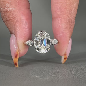 Seven stone Cushion Old European Cut diamond ring.
