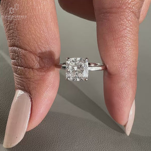 hidden halo engagement ring in white gold band.
