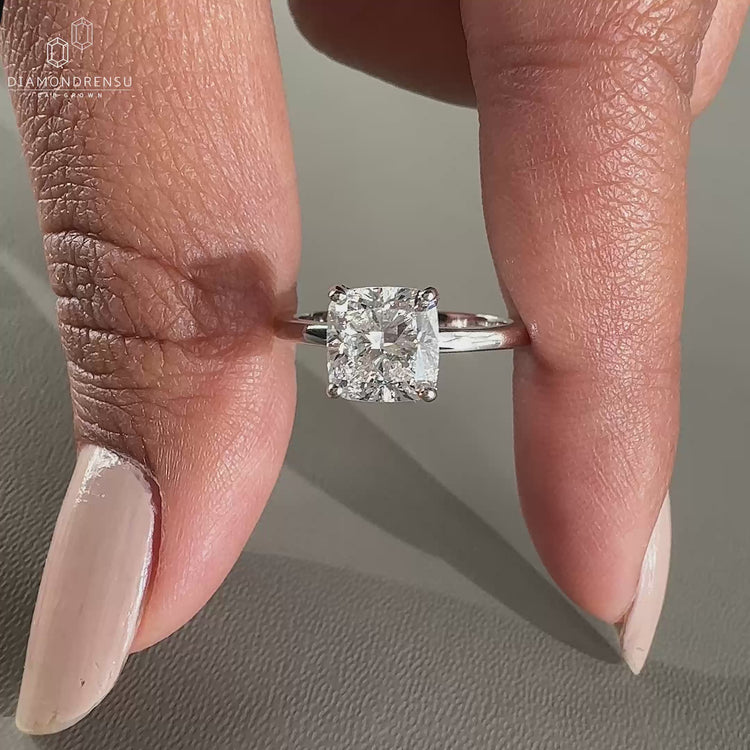 hidden halo engagement ring in white gold band.
