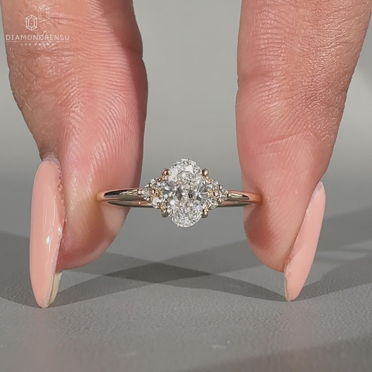 Handmade oval cut diamond ring in muse setting.
