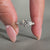 Emerald cut side stones ring in yellow gold.
