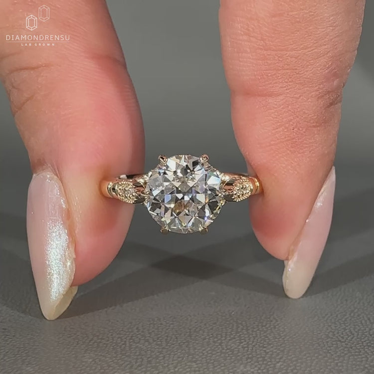 Old European Cut Diamond Ring in a cathedral setting design.
