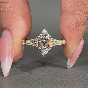 Marquise diamond ring cathedral six claw setting.