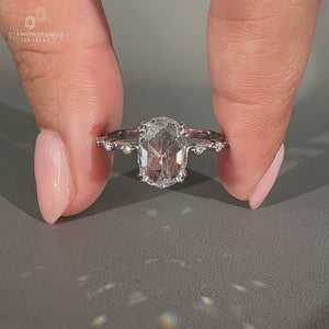 Handmade oval rose cut diamond ring with distance pave.
