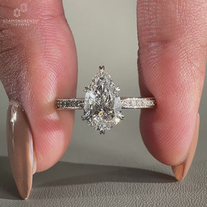 tapered pave band on white gold engagement ring.
