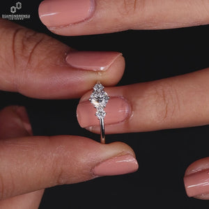 Round diamond ring crafted in polished white gold.
