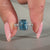 Handmade cushion cut diamond ring with round diamond pave.
