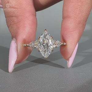 Handmade marquise diamond ring in muse setting.
