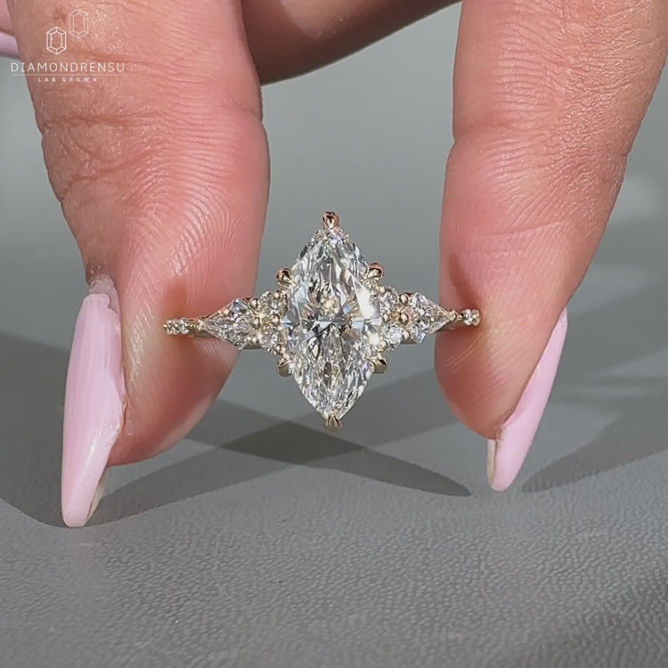 Handmade marquise diamond ring in muse setting.
