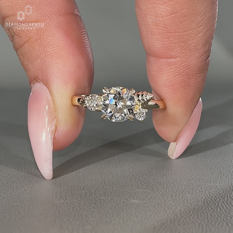 Three stone Round Old European Cut Lab Grown Diamond ring.
