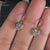 Heart shape diamond earrings with claw prong setting.

