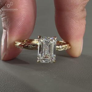 vintage engagement ring with round side stone.
