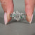 Dutch marquise ring with round and marquise side stones.