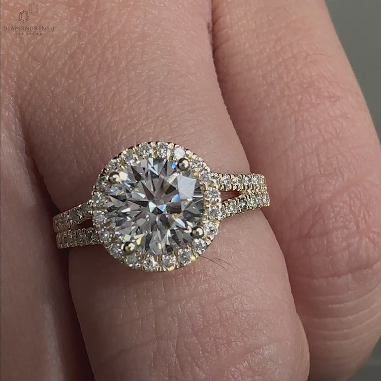 Round diamond engagement ring with cathedral setting.
