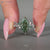 Nature inspired marquise ring with moss agate side stones.