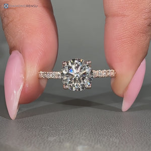 Round diamond ring with tulip basket setting.