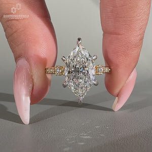Dutch marquise ring hidden halo pave six claw prong.
