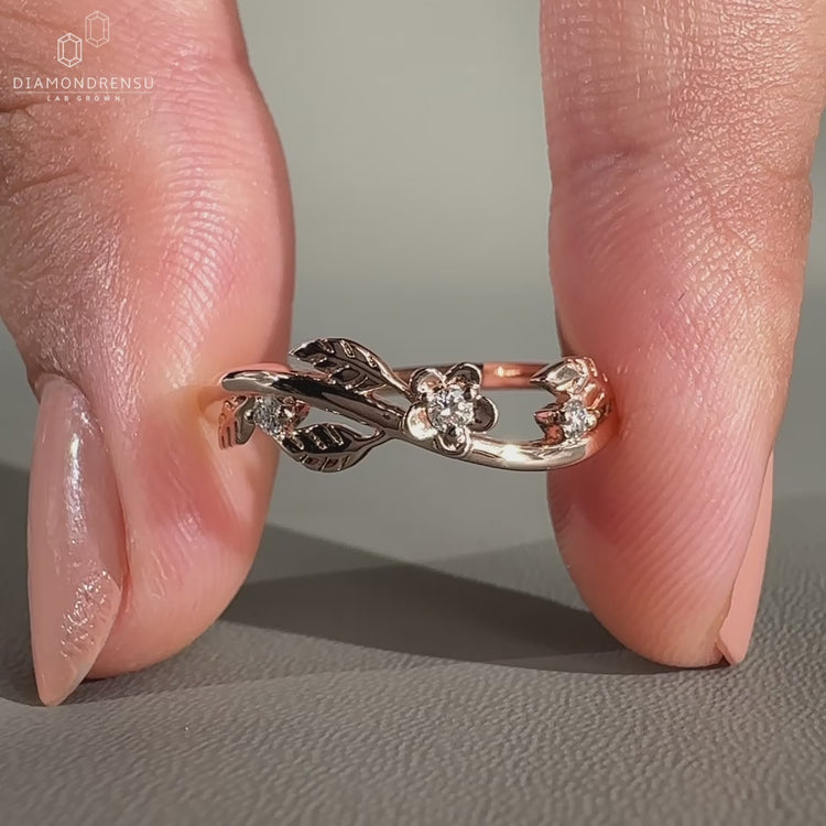 Rose gold wedding band with round cut diamond band.