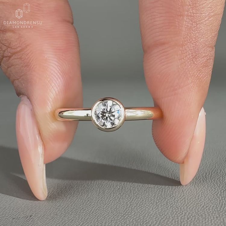 Minimalist bezel set solitaire engagement ring by Diamondrensu AU.
