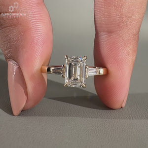 3 stone engagement ring in yellow gold diamond ring.
