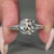 Two sided pave Cushion Old Mine Cut diamond ring.