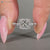 Princess diamond ring halo pave style.