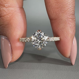 Compass prong setting in pave ring setting.
