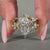 Dutch marquise bridal set with marquise and round side stones.