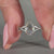Solitaire diamond ring in split shank ring design.
