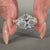 East west diamond ring with marquise cut and V shaped setting.
