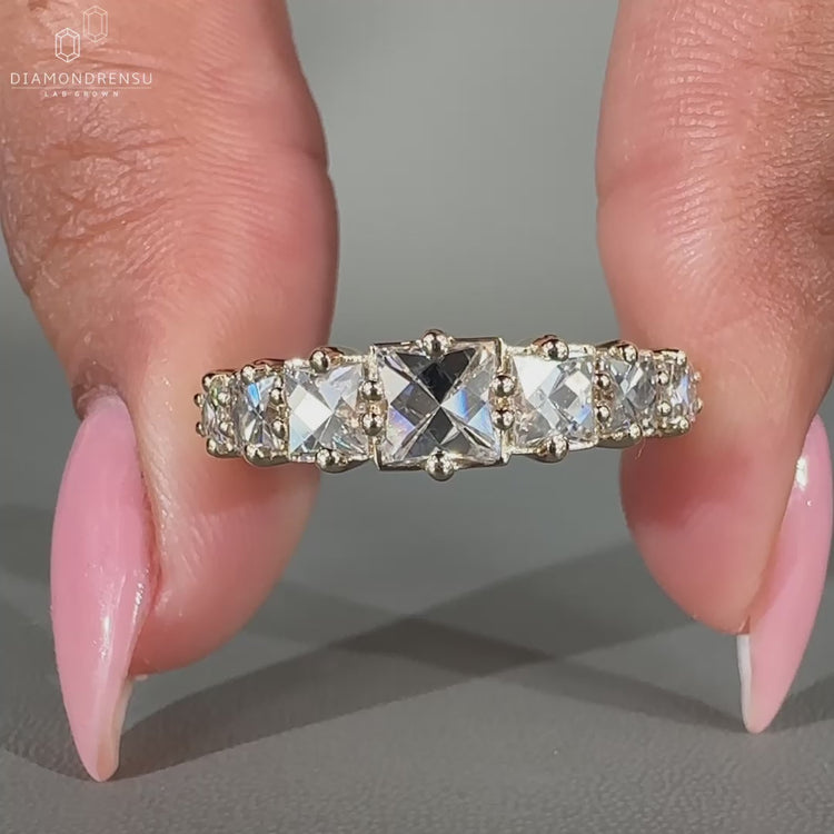 7 stone diamond band with lab grown diamonds.