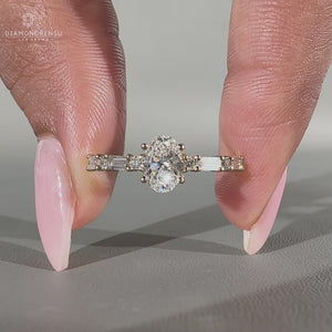 Yellow gold oval engagement ring with pavé setting.
