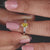 Pear diamond ring in Milgrain setting ring.
