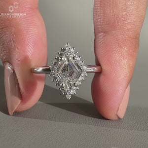 Round cut halo setting in white gold engagement ring.
