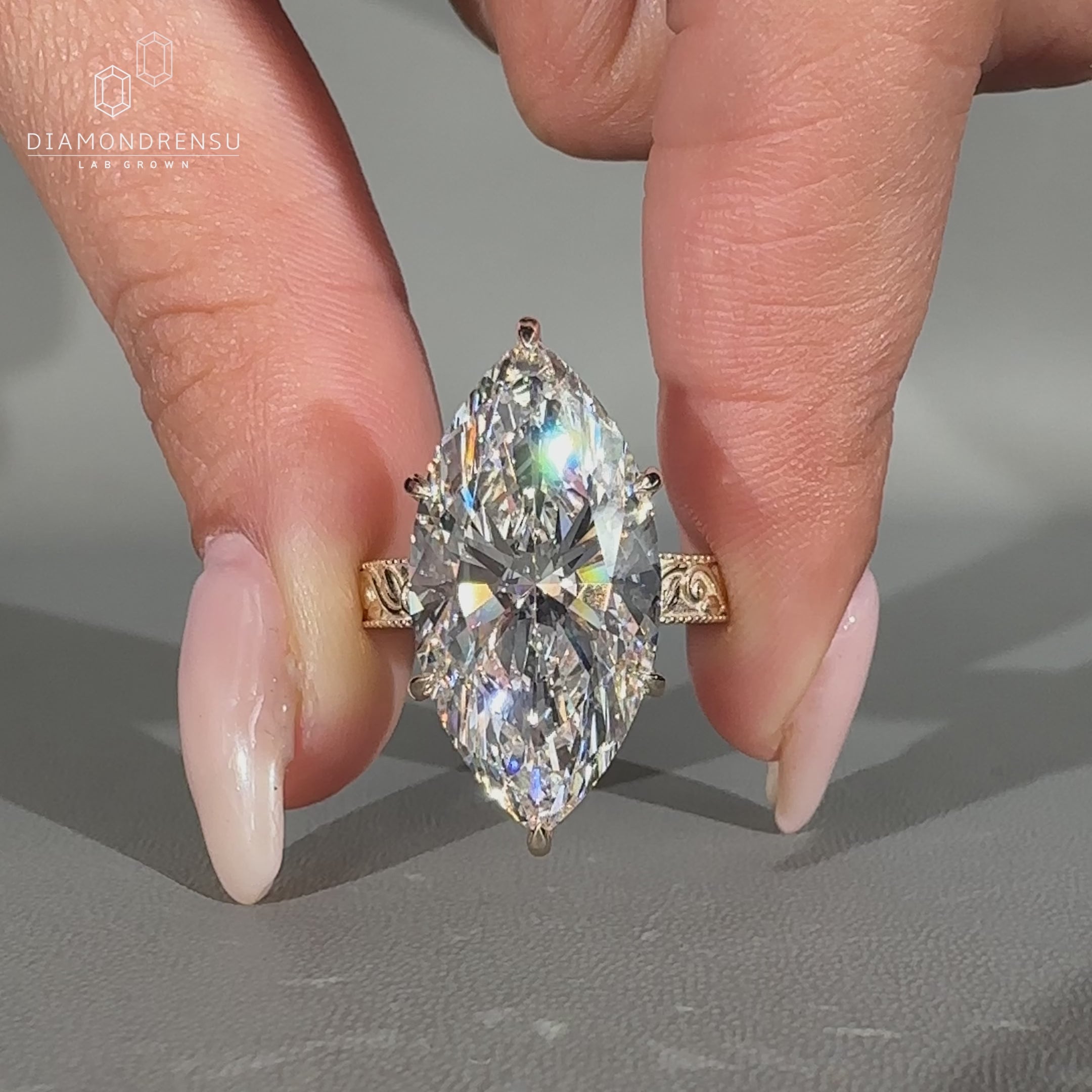 Marquise diamond ring in an art deco engagement design.