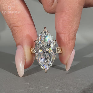 Marquise diamond ring in an art deco engagement design.