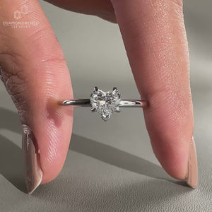 Heart shaped diamond ring crafted in yellow gold.
