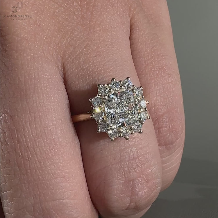 Ring with round side stones for added brilliance.
