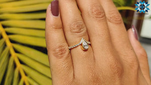 0.77 TCW Pear Cut Upside Down Bezel Set Moissanite Ring