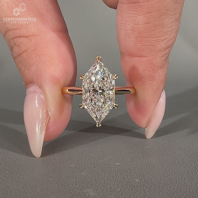 Handmade Dutch marquise ring with six leaf style prong.
