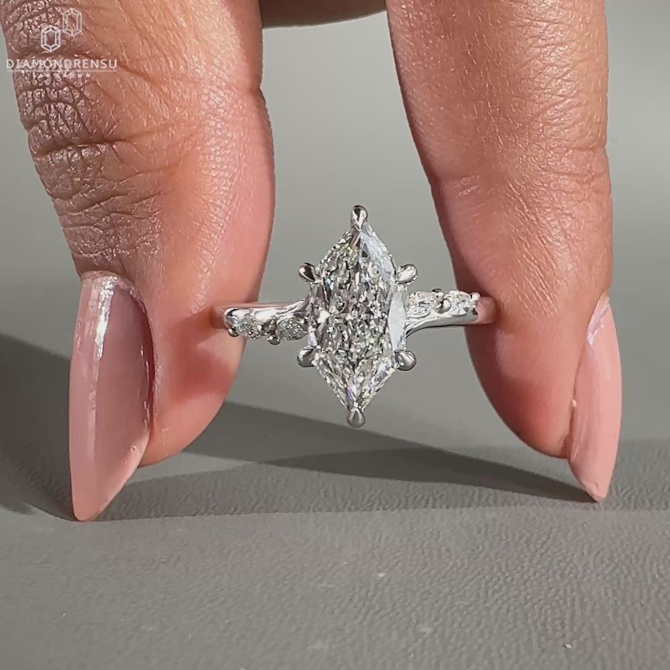 Bridge accent setting in white gold ring.
