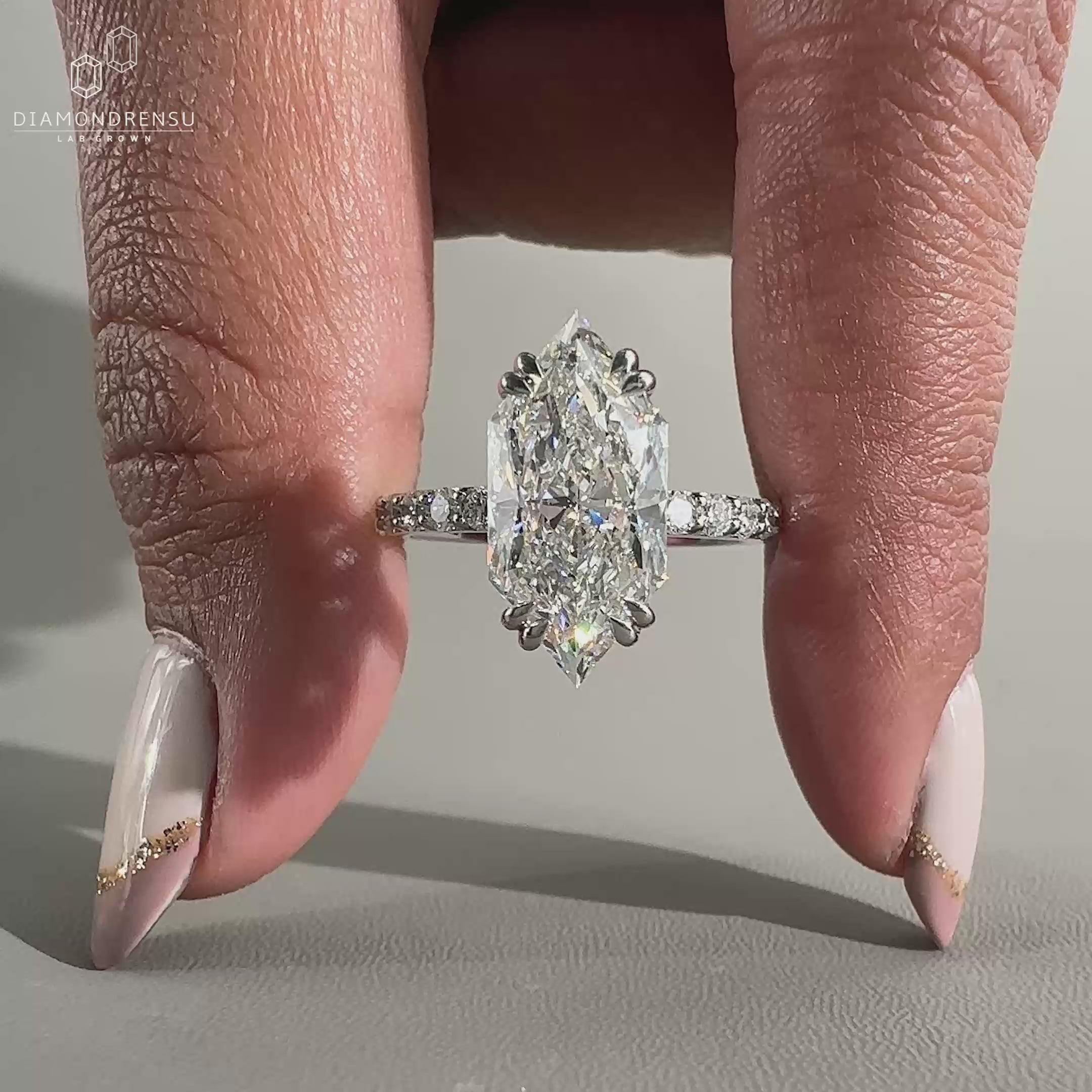 Dutch marquise diamond engagement ring in white gold ring.
