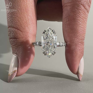 Dutch marquise diamond engagement ring in white gold ring.
