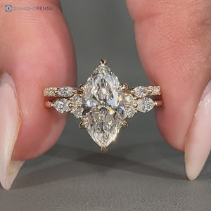 Marquise bridal set with seven stone ring design.