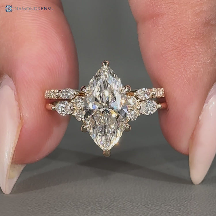 Marquise bridal set with seven stone ring design.