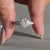 Tapered shank pave ring in white gold engagement ring.
